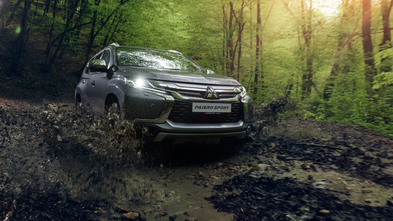 /img/cars/1637052712-exterior_mitsubishi_Pajero_Sport_2.jpg