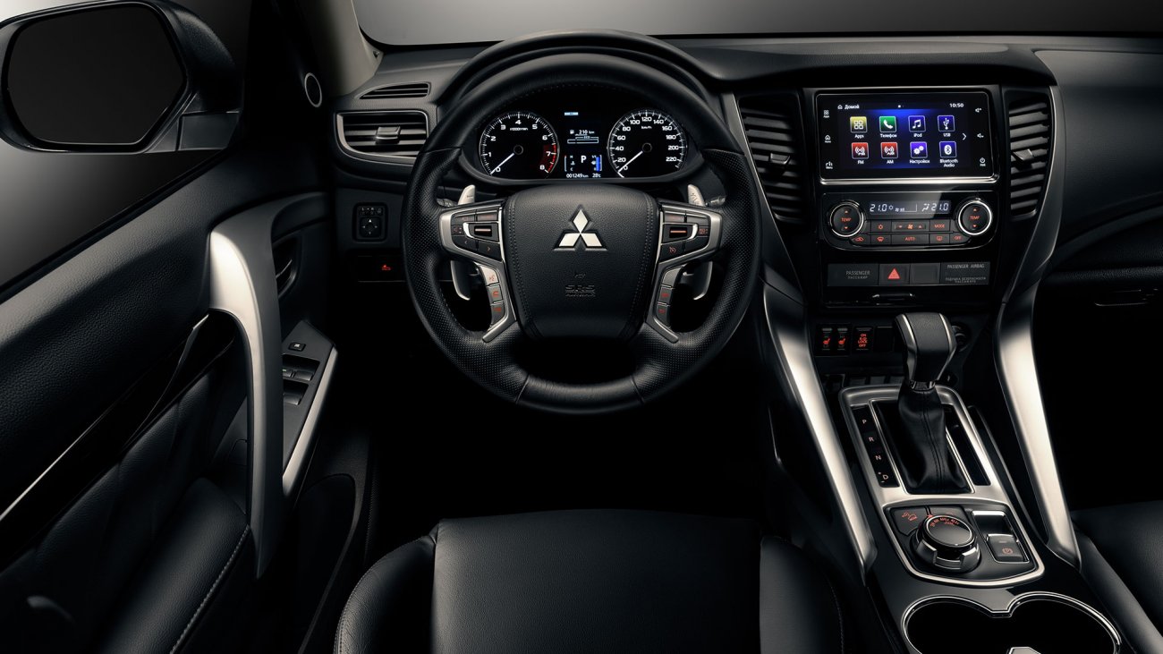 /img/cars/1637052713-interior_mitsubishi_Pajero_Sport_2.jpg
